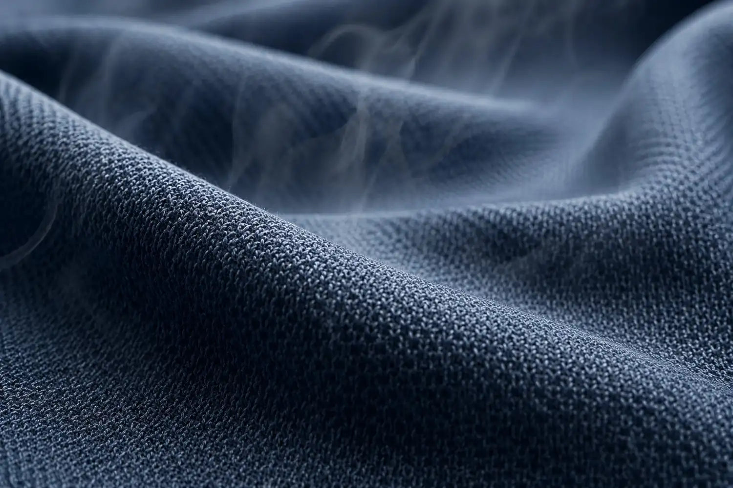 Close-up of textured blue fabric with smoke effect