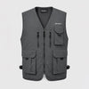 A dark gray zip-up vest with multiple utility pockets, shown against a light gray background. The brand 'Eddie Biers' is visible on the chest and inner label.