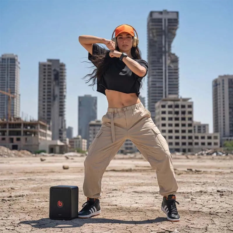Woman wearing the sand Pathfinder 6-pocket water-resistant cargo pants in a lifestyle